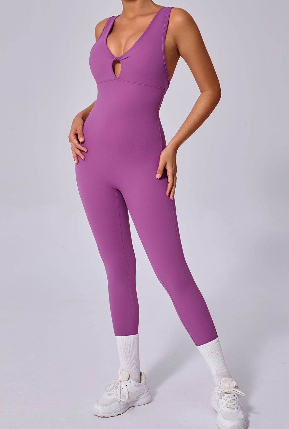 Backless Sporty Jumpsuit with Crisscross Straps.