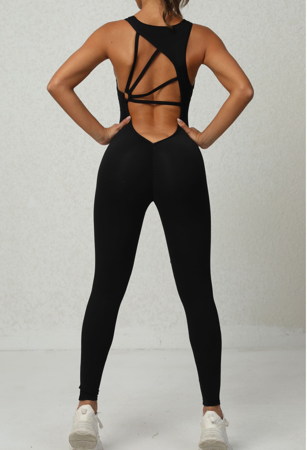 Backless Sporty Jumpsuit with Crisscross Straps.