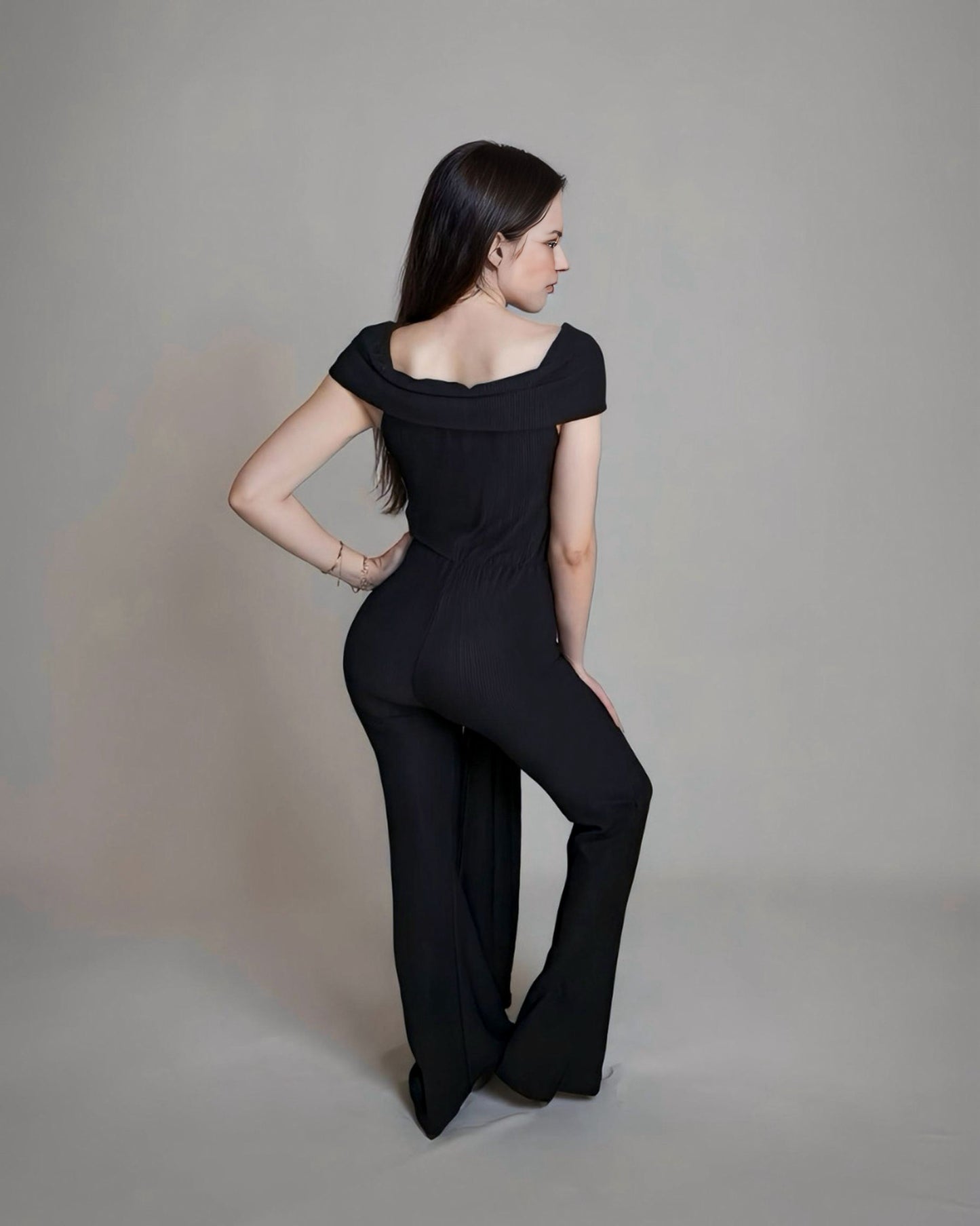 Off-shoulder ribbed knit jumpsuit.