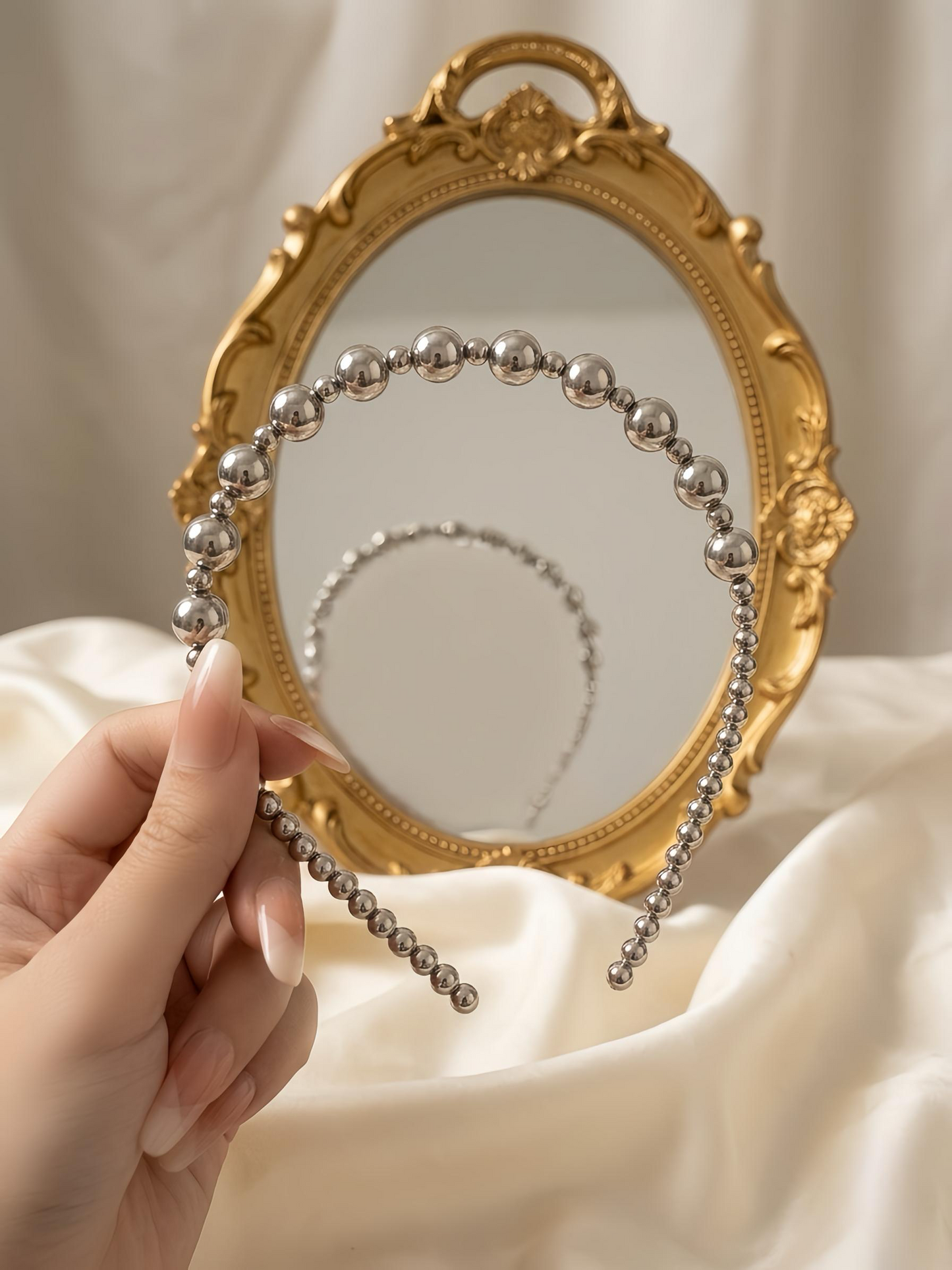 Elegant graduated beaded tiara.