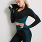 A three-piece athletic set consisting of a sports bra, leggings, and a zip-up jacket.