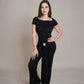 Off-shoulder ribbed knit jumpsuit.