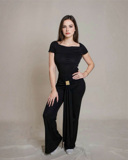 Off-shoulder ribbed knit jumpsuit.