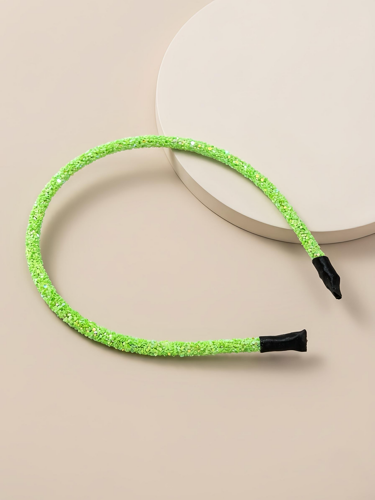 Glittery beaded slim headband.