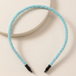 Glittery beaded slim headband.
