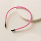 Glittery beaded slim headband.