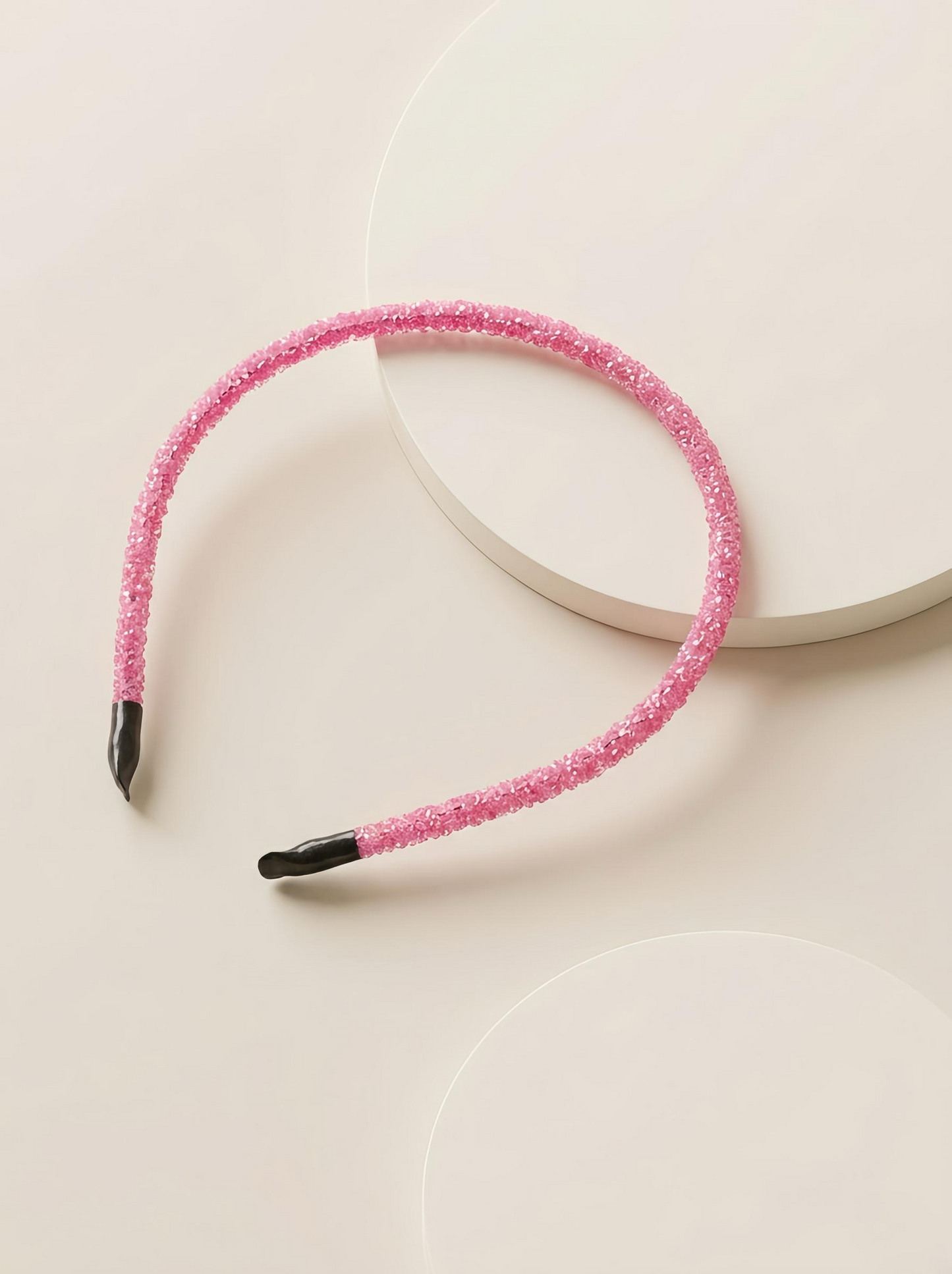 Glittery beaded slim headband.