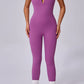 Backless Sporty Jumpsuit with Crisscross Straps.