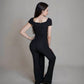 Off-shoulder ribbed knit jumpsuit.