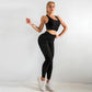 A three-piece athletic set consisting of a sports bra, leggings, and a zip-up jacket.