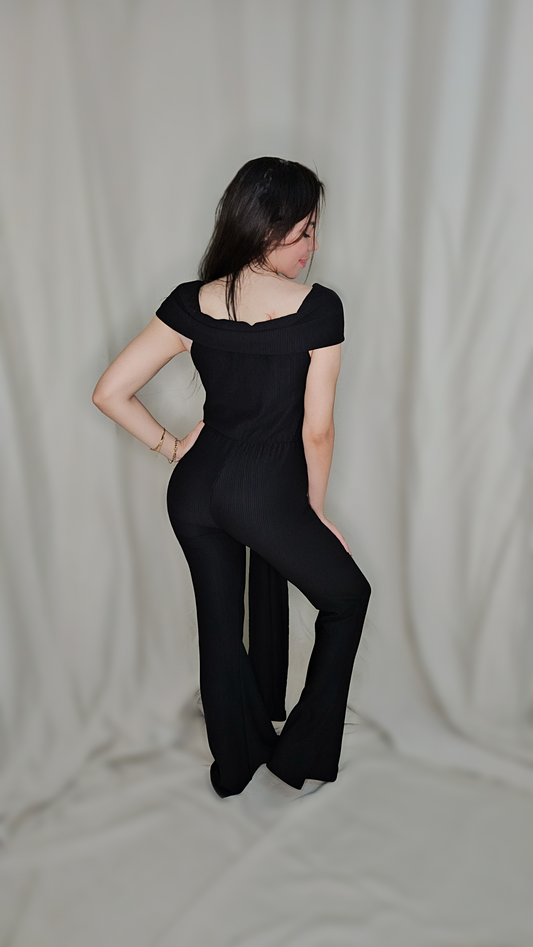 Off-shoulder ribbed knit jumpsuit.