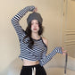Design sense off-the-shoulder striped T-shirt women's 2022 autumn new niche tight-fitting long-sleeved slim short student tops