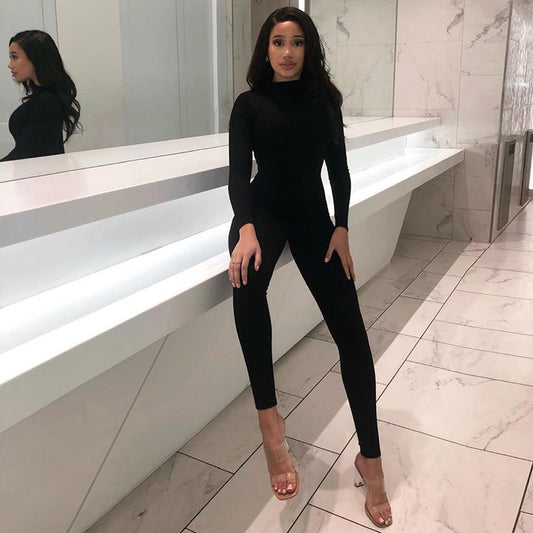 Form-fitting black jumpsuit.