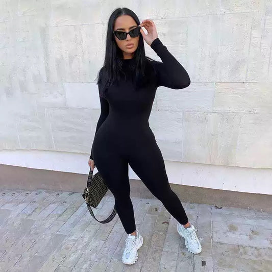 Form-fitting black jumpsuit.