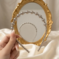 Elegant graduated beaded tiara.