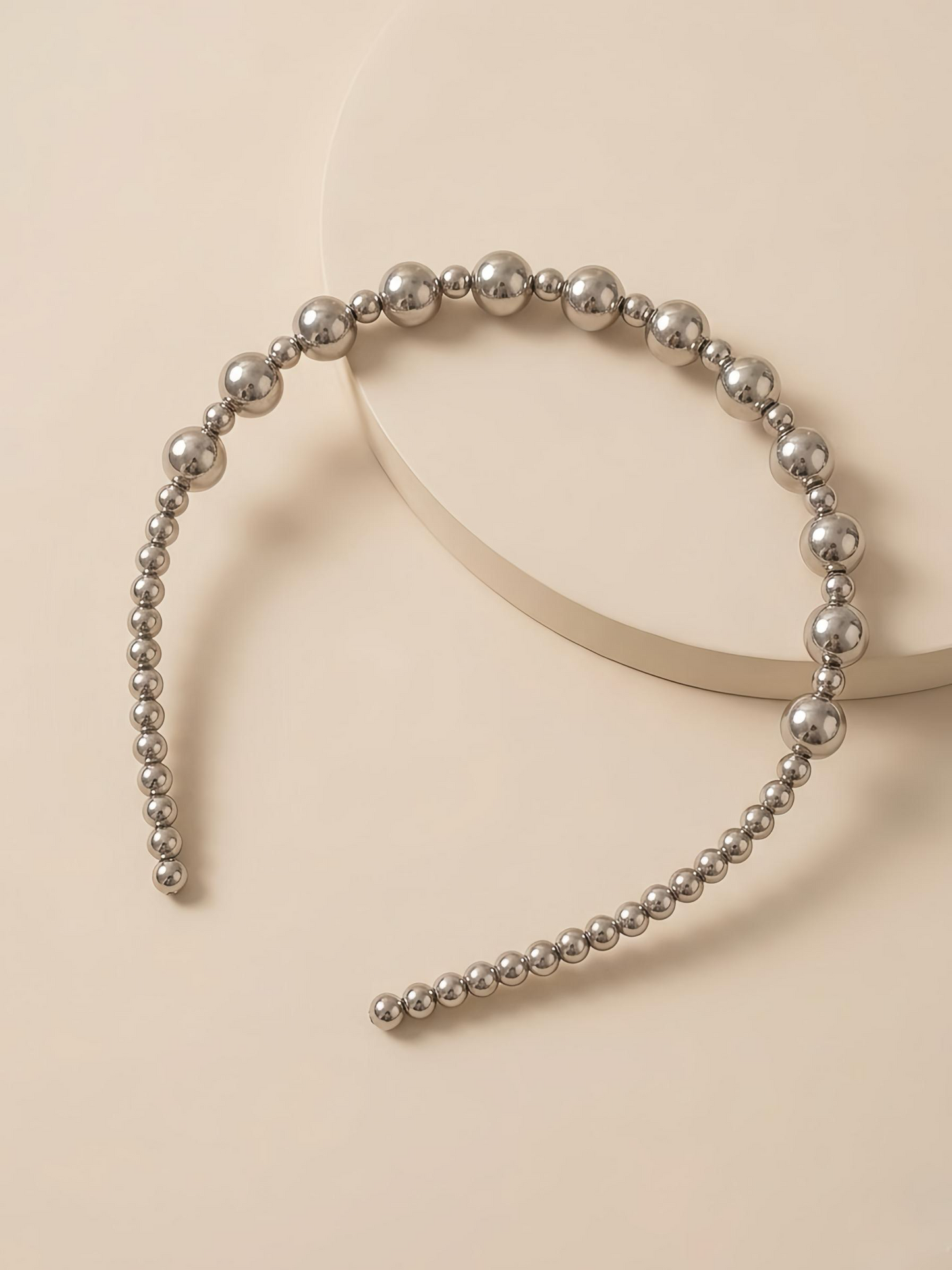 Elegant graduated beaded tiara.