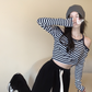 Design sense off-the-shoulder striped T-shirt women's 2022 autumn new niche tight-fitting long-sleeved slim short student tops